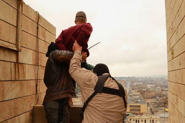 Man about to be pushed off a roof